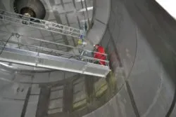 Non destructive testing and integrity inspection using our unique access bridge on a spray dryer chamber. Spray dryer testing Spray dryer testing and inspection using our unique access platform